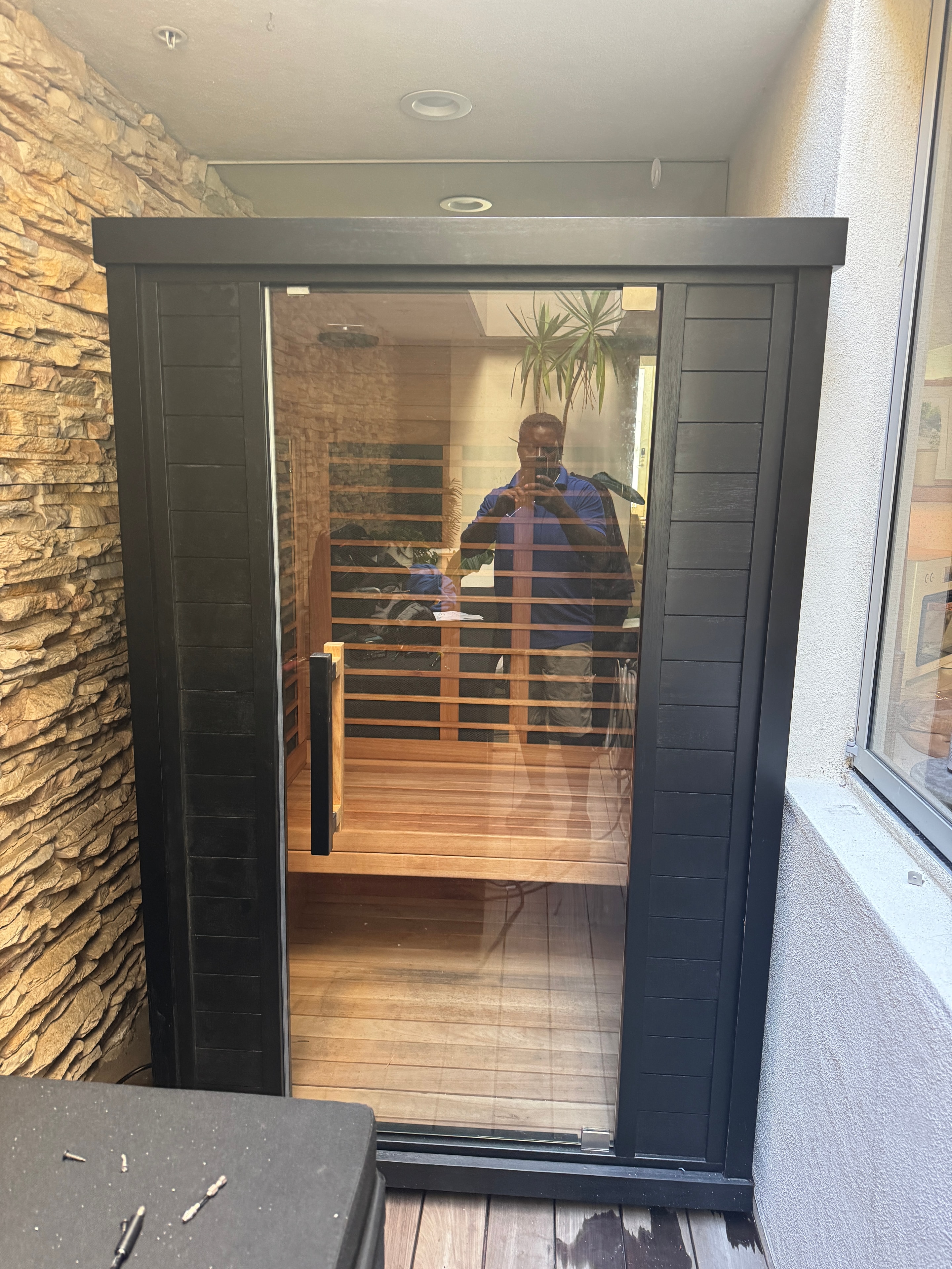 Modular glass panel and wood frame structure installation