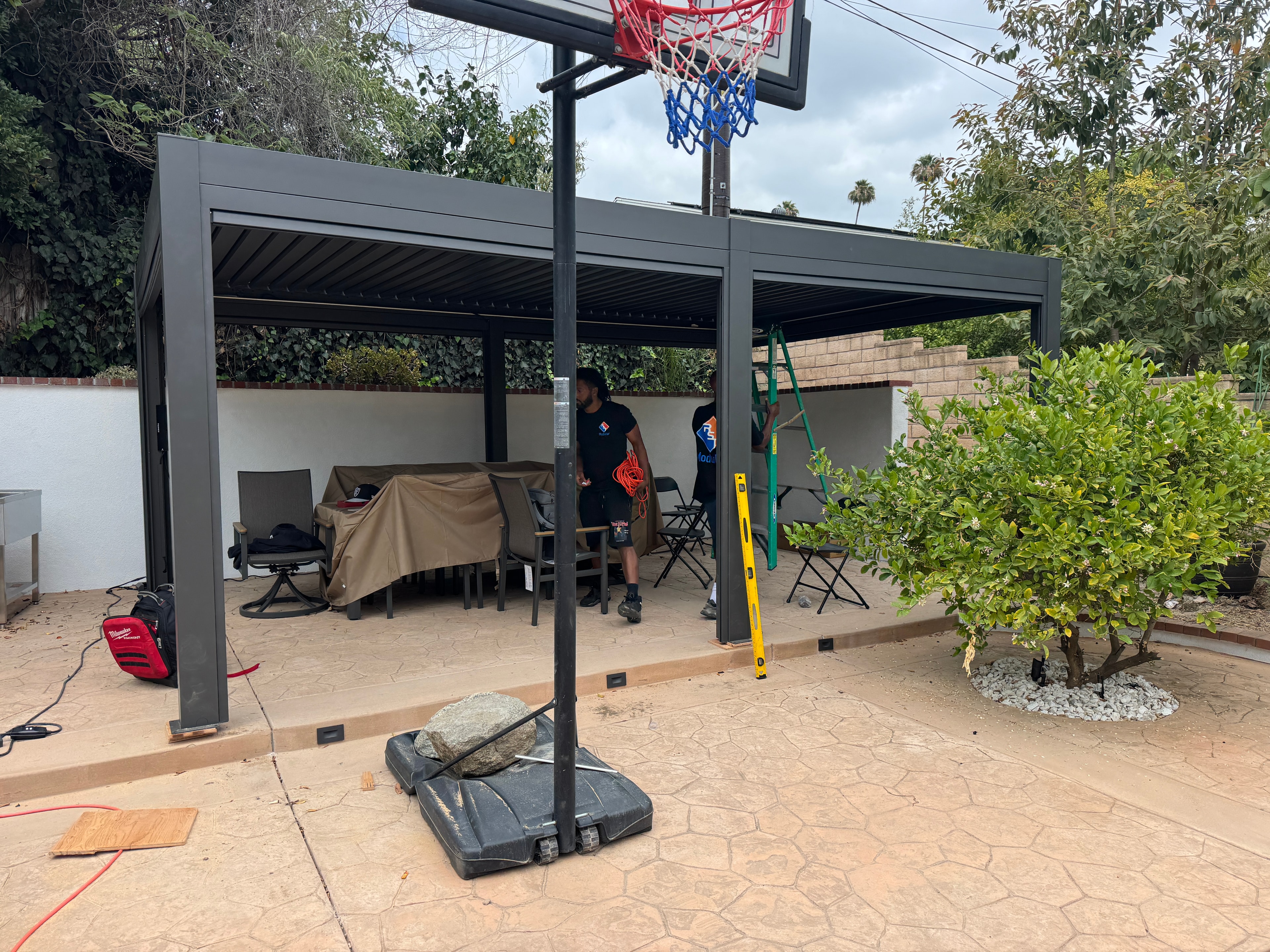 Modular pergola installation in progress — RST Modular crew on site